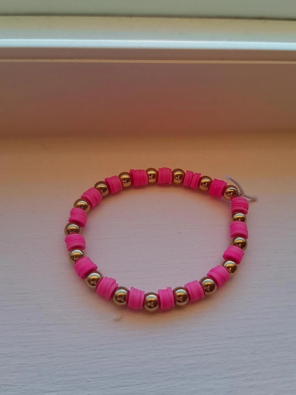 Pink Bead Stretch Bracelet with Gold Accent